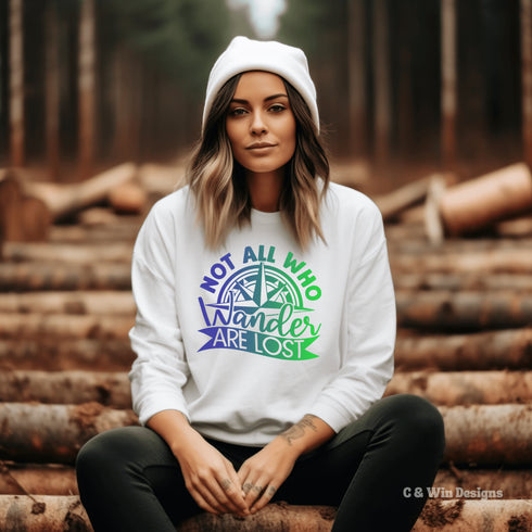 This sweatshirt features a stunning colorful gradient graphic that will make you stand out on your outdoor escapades. With the inspiring saying "Not All Who Wander Are Lost" emblazoned across the front, this sweater is not just a piece of clothing, but a statement of your adventurous spirit and love for exploration.